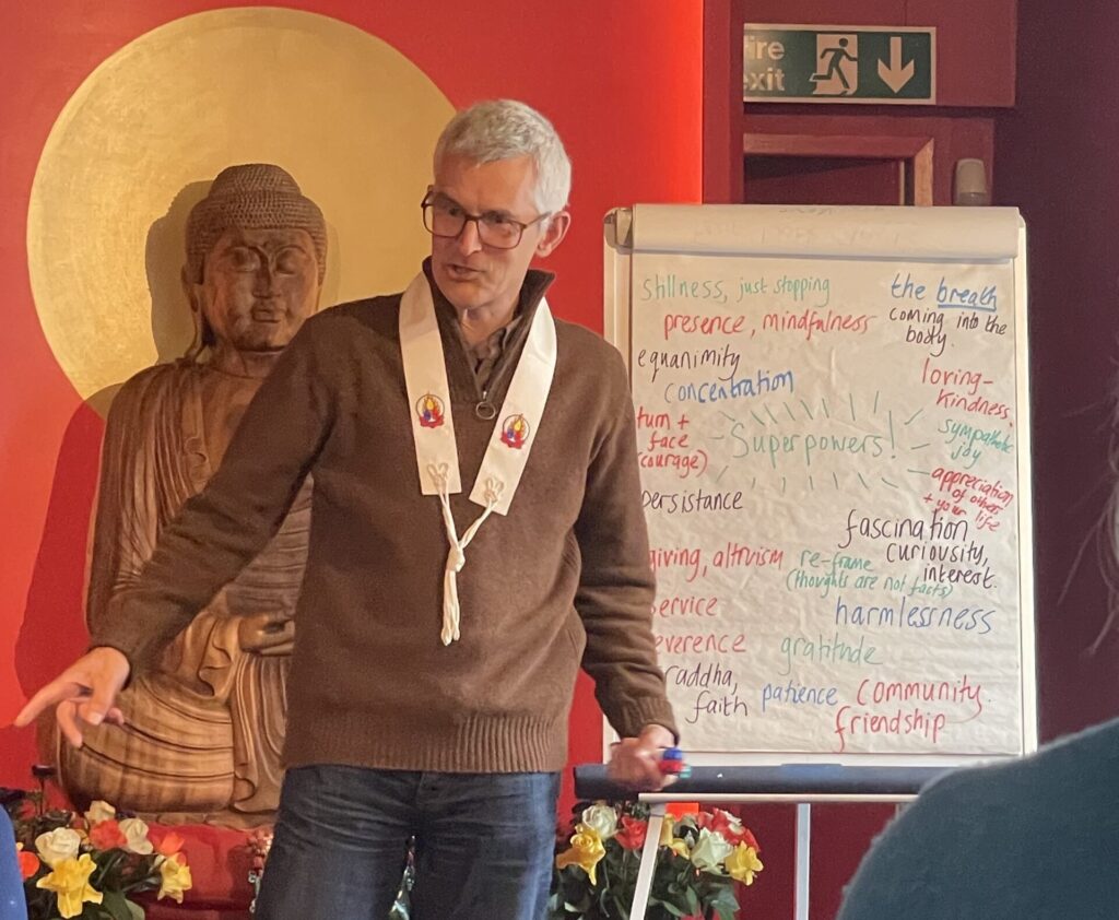 Vajragupta leading a discussion on what superpowers we have to live with fearlessness
